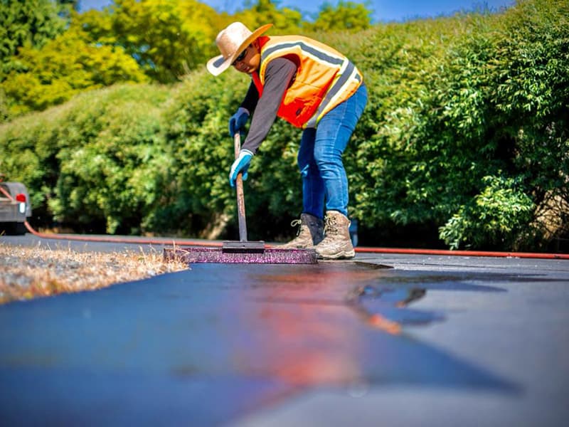 Professional asphalt paving in progress
