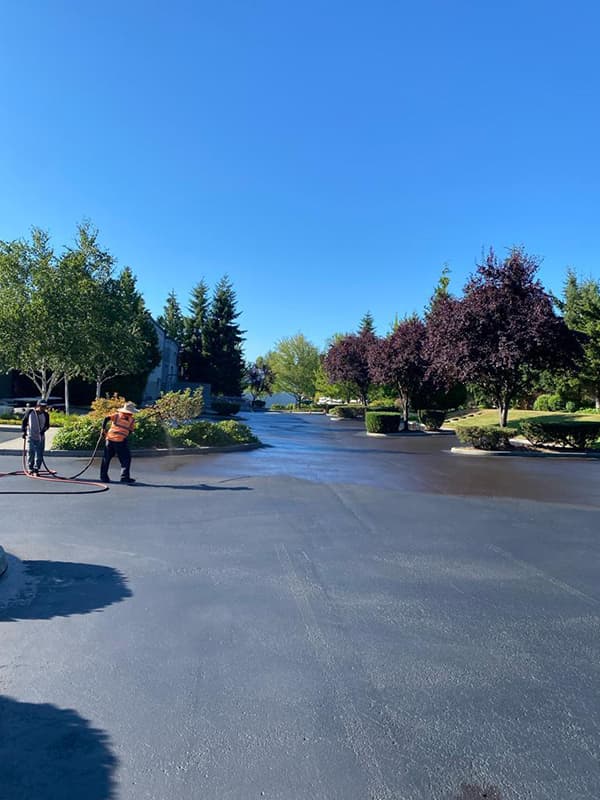 Paving professionals completing a driveway