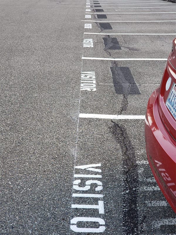 Striping crew completing a parking lot project